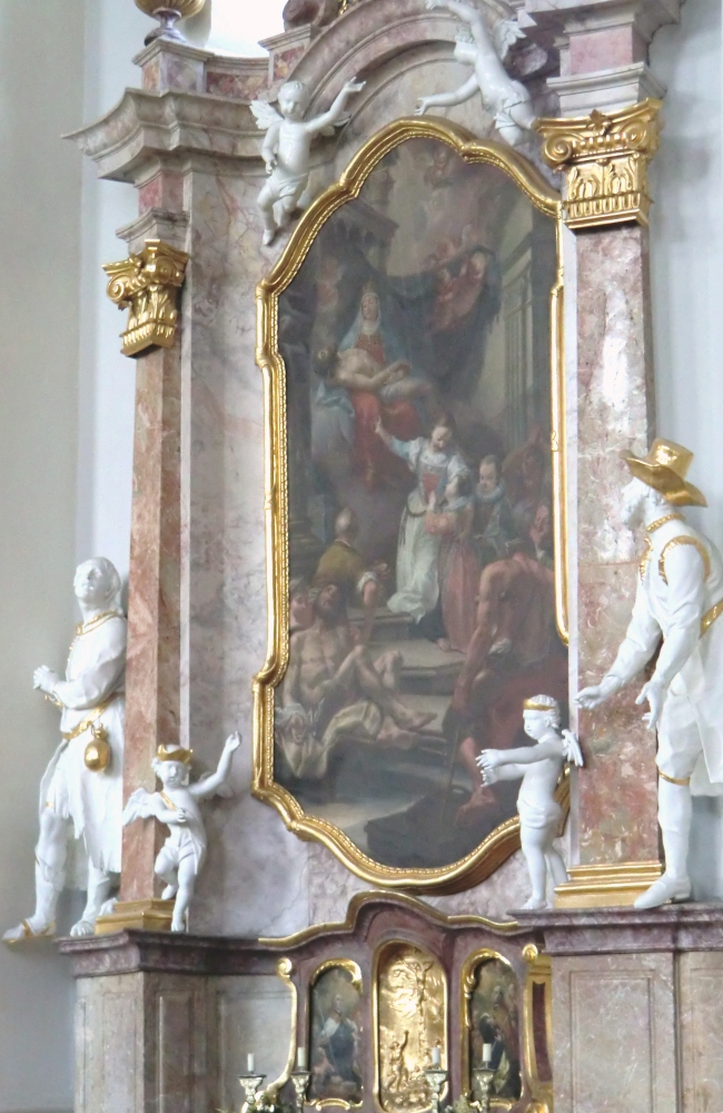 Notburgaaltar mit Altarbild von Philipp Haller: Notburga empfiehlt Arme und Kranke der Muttergottes, 1758; seitliche Figuren von Franz Xaver Nissl: Wendelin (links) und Isidor von Madrid (rechts), 1759; in der Kirche des Klosters in Fiecht